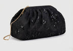 Chloé Millaut - Håndholdt sort clutch i stof prydet med blomsterprint og palietter